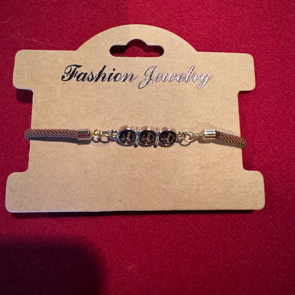 Elegant Gold and Black Bracelet